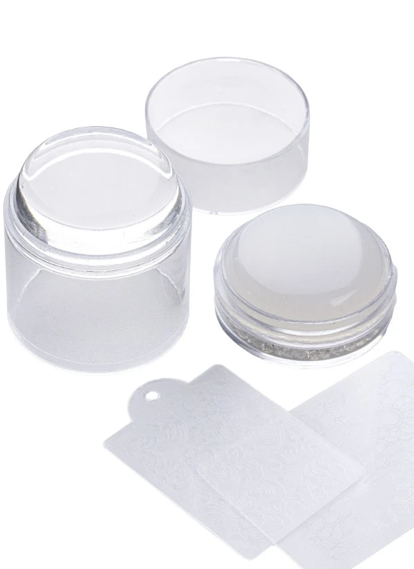 Double-sided stamper for high-quality image transfer from plate to nail.Both stamper heads are made of high-quality silicone that perfectly transfers even the finest designs.The stamper adapts to any nail shape, ensuring a clear and vibrant imprint.Equipped with a protective cap to prevent damage, dirt and dust.No preparation required before use.Do not use acetone for cleaning!Set includes:• Two interchangeable heads – transparent (for quick and easy standard stamping) and white (for reduced-siz...