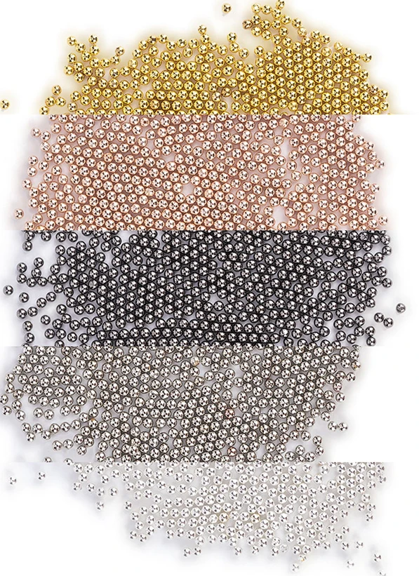 Metallic beads for nail designs with rhinestones and pearls. Ideal for creating subtle accents and enhancing nail art.Diameter: 0.8 mm...